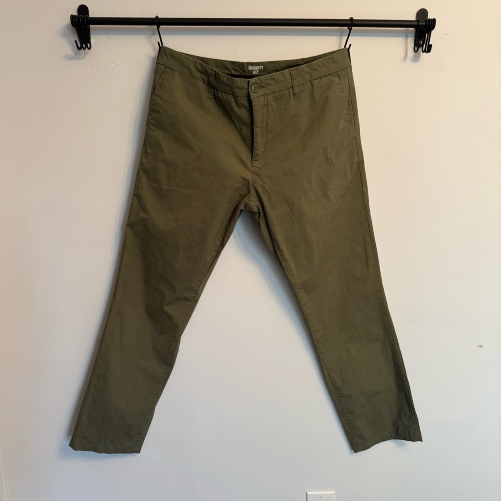 Mens Carhartt WIP lightweight cotton poplin pants in olive green.